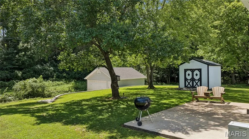 Sit back and enjoy the shade. This is what real backyard privacy looks like. — 416 Loiselaine Drive, O'Fallon, MO 63366