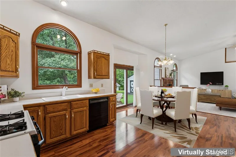 A kitchen built for real life, plenty of cabinet space and a layout that keeps you connected to the action. — 416 Loiselaine Drive, O'Fallon, MO 63366