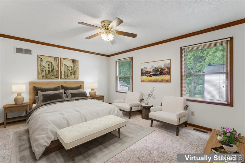 Your private retreat, complete with an en suite bathroom and a spacious walk-in closet. Space to unwind, space to spread out, all in one suite. — 416 Loiselaine Drive, O'Fallon, MO 63366