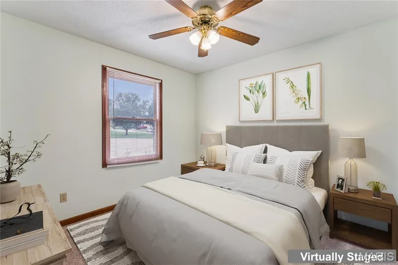 Bright, comfortable, and full of possibility, use it as a bedroom, office, or guest room, the choice is yours. — 416 Loiselaine Drive, O'Fallon, MO 63366