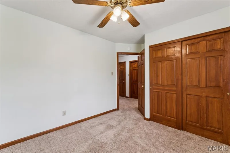 A spacious closet adds everyday function to this bright, comfortable bedroom, simple, practical, and easy to make your own. — 416 Loiselaine Drive, O'Fallon, MO 63366