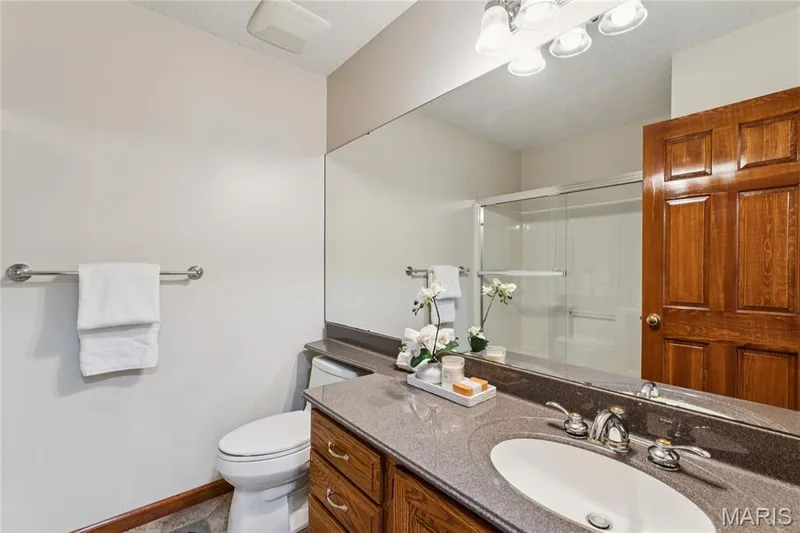 A guest bath that feels anything but an afterthought, stylish finishes and a shower-tub combo ready for family or visitors alike. — 416 Loiselaine Drive, O'Fallon, MO 63366