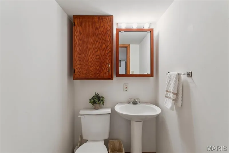 Convenience continues downstairs with a half bath that makes the lower level fully livable. — 416 Loiselaine Drive, O'Fallon, MO 63366