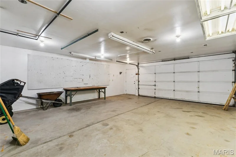 This isn't just extra parking. It's a dedicated workshop ready for hobbies, storage, or whatever project comes next. — 416 Loiselaine Drive, O'Fallon, MO 63366