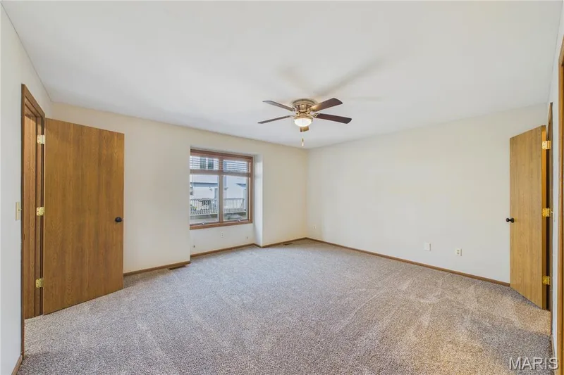 Primary bedroom with 2 walk-in closets — 3405 Sherman Park Drive #4C, St Charles, MO 63303