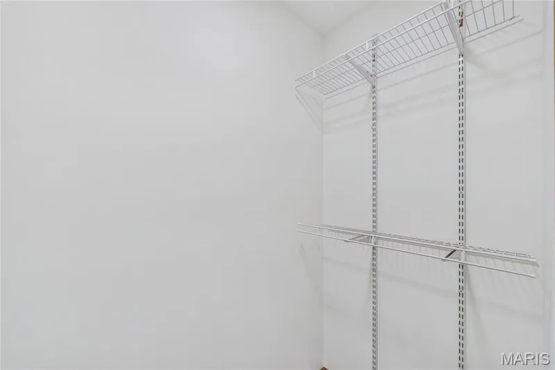 Walk-in closet 2 of 2 in Primary Bedroom — 3405 Sherman Park Drive #4C, St Charles, MO 63303