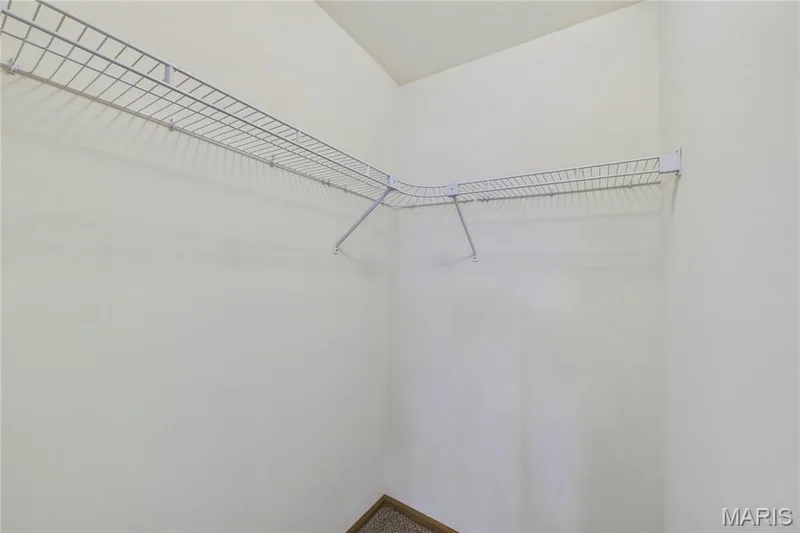 Walk-in closet 1 of 2 in Primary Bedroom — 3405 Sherman Park Drive #4C, St Charles, MO 63303
