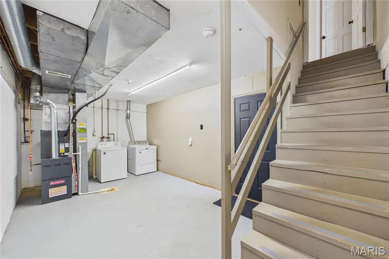 Laundry and storage just inside from the garage — 3405 Sherman Park Drive #4C, St Charles, MO 63303