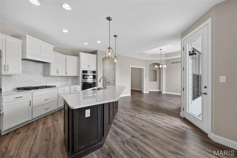 Kitchen with Island and Seating Bar — 149 Haven Ridge Court, Dardenne Prairie, MO 63368