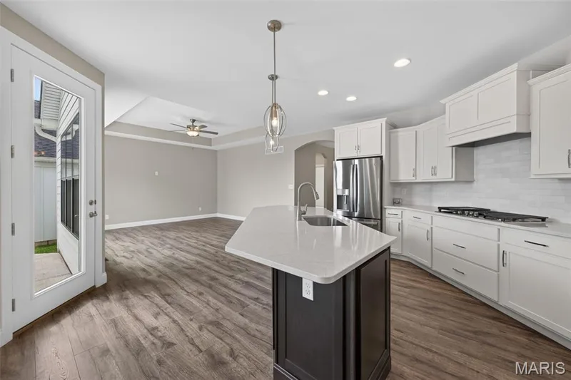 Kitchen with Custom Cabinets and Stainless Steel Appliances — 149 Haven Ridge Court, Dardenne Prairie, MO 63368