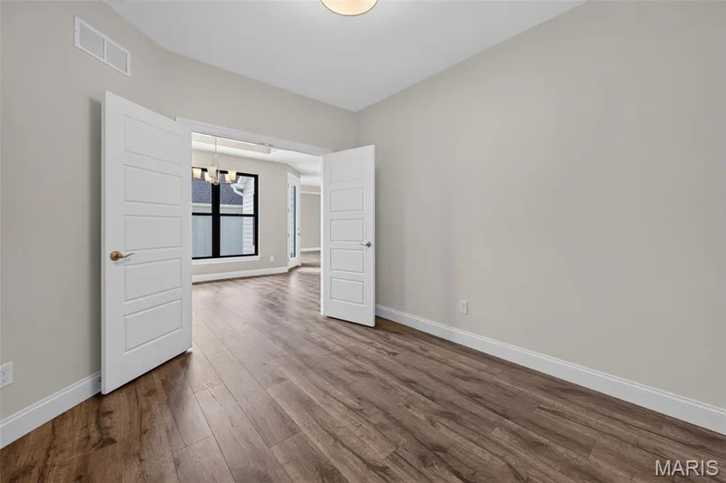 Main Floor Office with French Doors and Luxury Vinyl Plank Flooring — 149 Haven Ridge Court, Dardenne Prairie, MO 63368