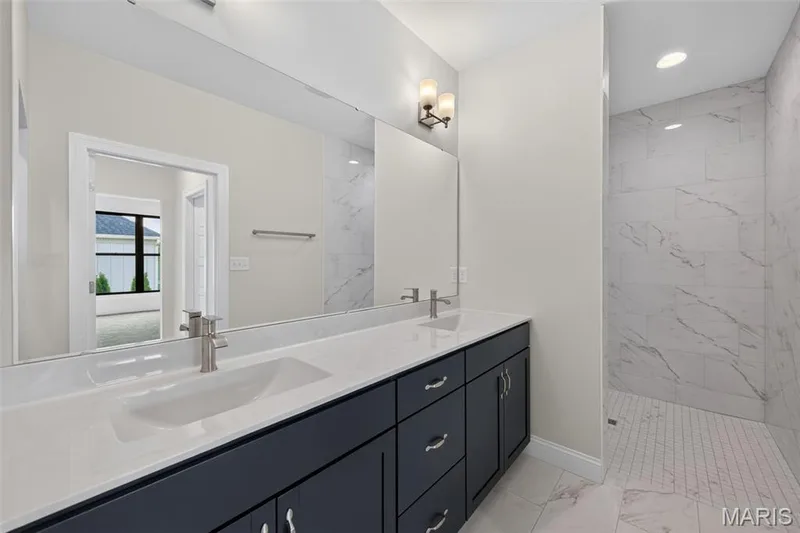 Raised Height Double Bowl Vanity and a Zero Threshold Walk In Shower — 149 Haven Ridge Court, Dardenne Prairie, MO 63368