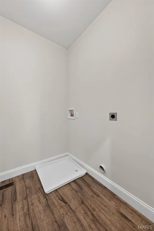 Main Floor Laundry Room with Luxury Vinyl Plank Flooring — 149 Haven Ridge Court, Dardenne Prairie, MO 63368