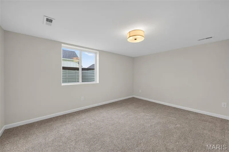 Bedroom with Egress in the Finished Lower Level — 149 Haven Ridge Court, Dardenne Prairie, MO 63368
