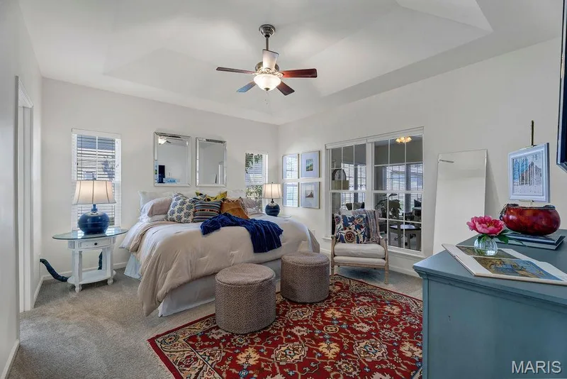 Enjoy this beautiful primary bedroom with its tray ceiling. — 781 Queens Court Place, St Peters, MO 63376
