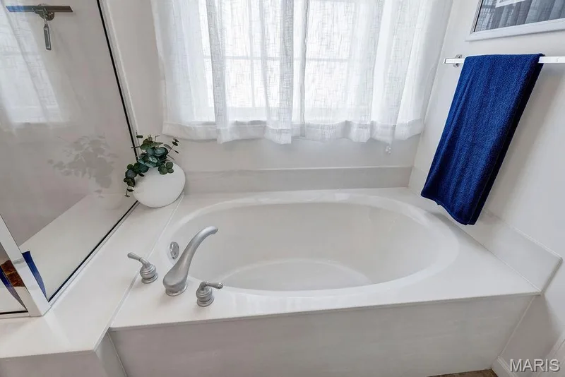 Plus, you get a large oval tub - perfect for soaking your cares away! — 781 Queens Court Place, St Peters, MO 63376