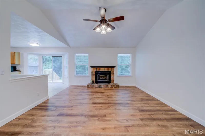 Vaulted Great Room with Wood Burning Fire Place and Ceiling Fan — 868 Molloy Drive, O'Fallon, MO 63366
