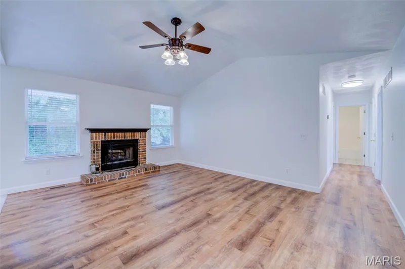 Vaulted Great Room with Wood Burning Fire Place and Ceiling Fan — 868 Molloy Drive, O'Fallon, MO 63366