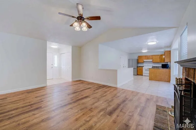 View from Great Room into Kitchen and Foyer — 868 Molloy Drive, O'Fallon, MO 63366