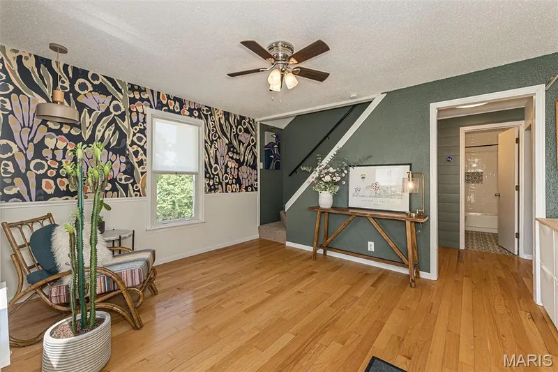 Charming Living room with Ceiling fan. and hardwood flooring — 17723 Mueller Road, Wildwood, MO 63038
