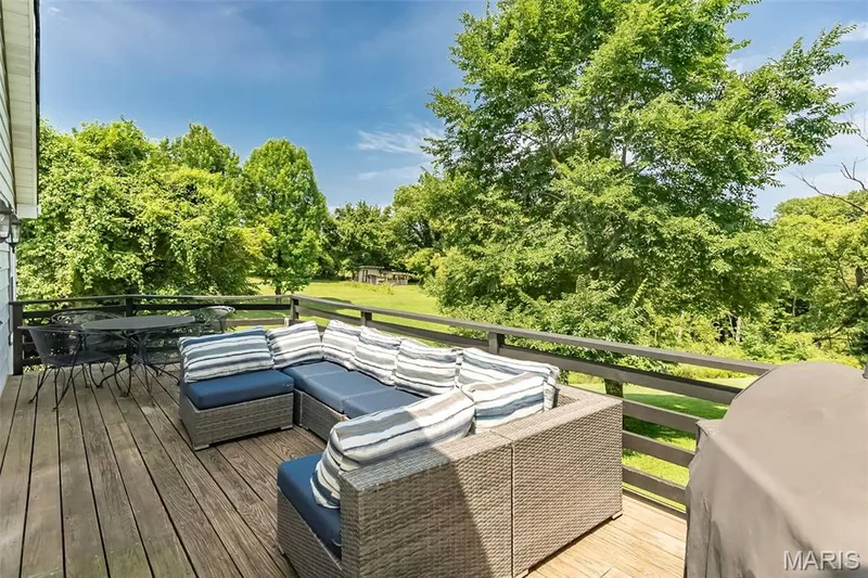 Wood deck with view to woods and firepit — 17723 Mueller Road, Wildwood, MO 63038