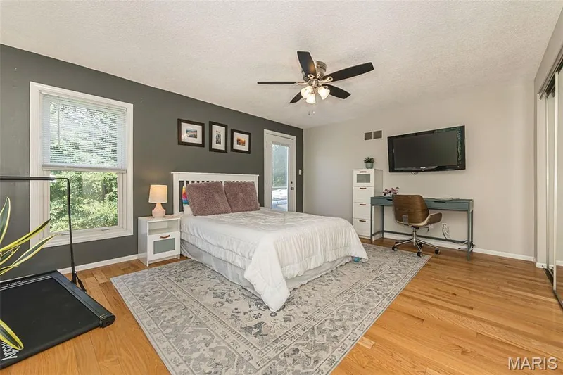 Window blinds and French door leads to huge deck — 17723 Mueller Road, Wildwood, MO 63038