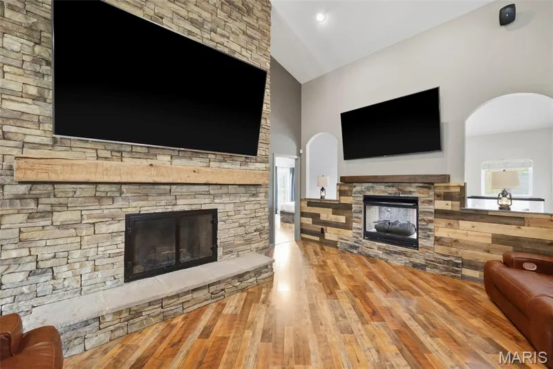 Dramatic floor to ceiling stacked stone fireplace — 1 Priority Drive N, Wentzville, MO 63385