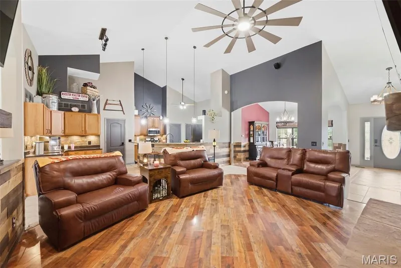 Windmill style fan on cathedral vaulted ceiling — 1 Priority Drive N, Wentzville, MO 63385