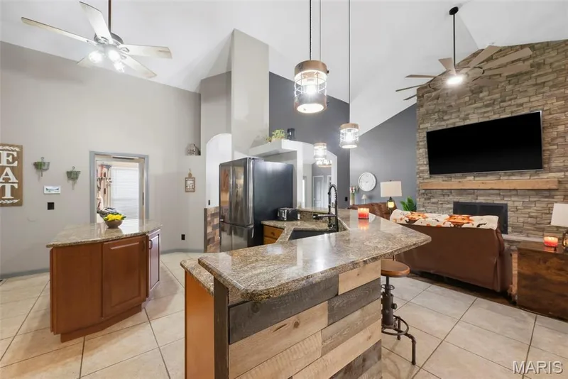 Kitchen looking into great room — 1 Priority Drive N, Wentzville, MO 63385
