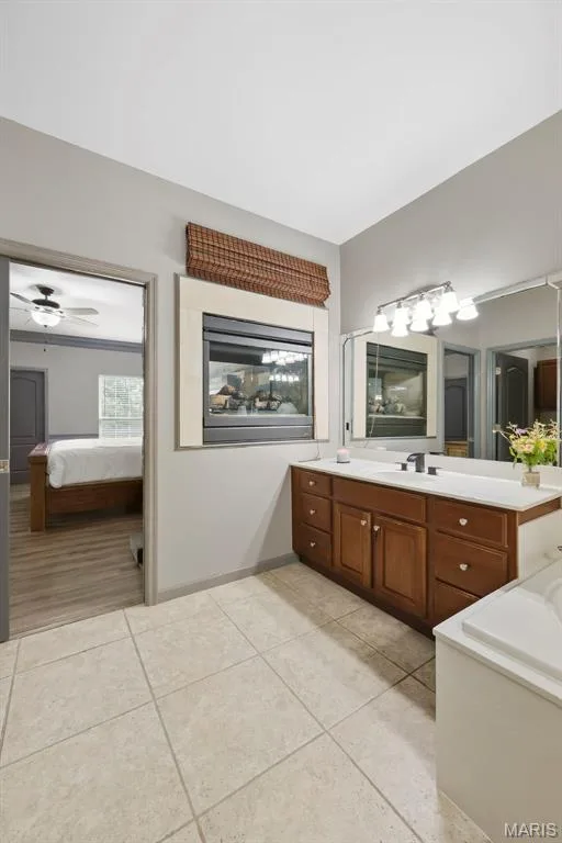 See through fireplace to primary bedroom — 1 Priority Drive N, Wentzville, MO 63385