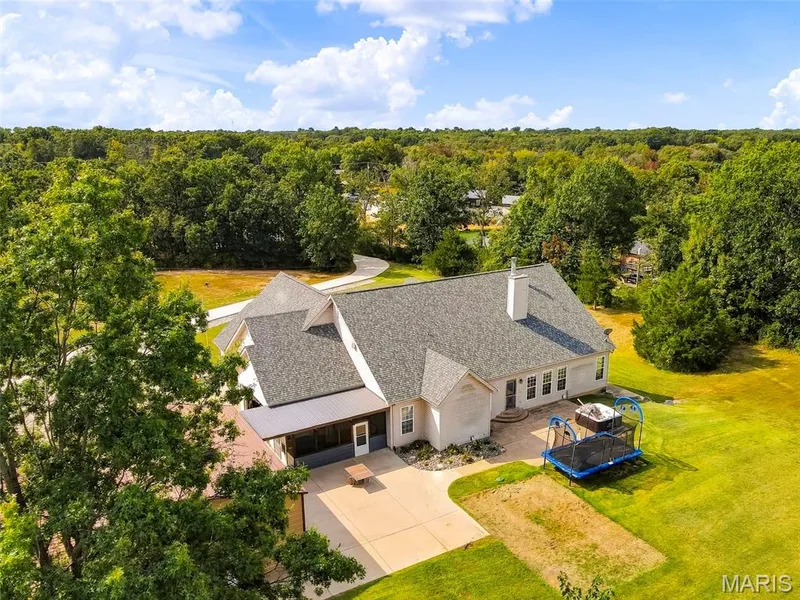 Large patio off the back of the home — 1 Priority Drive N, Wentzville, MO 63385
