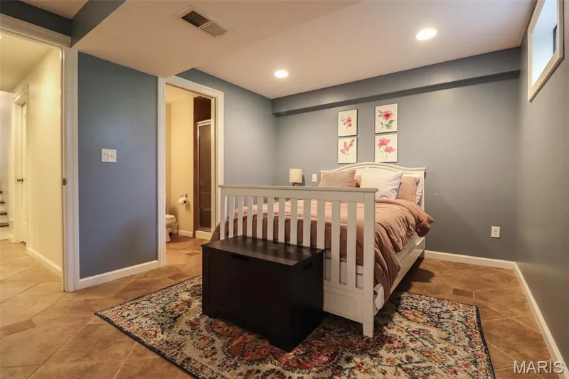 Lower level sleeping area with full bathroom — 12 Pyrenees Drive, Lake St. Louis, MO 63367