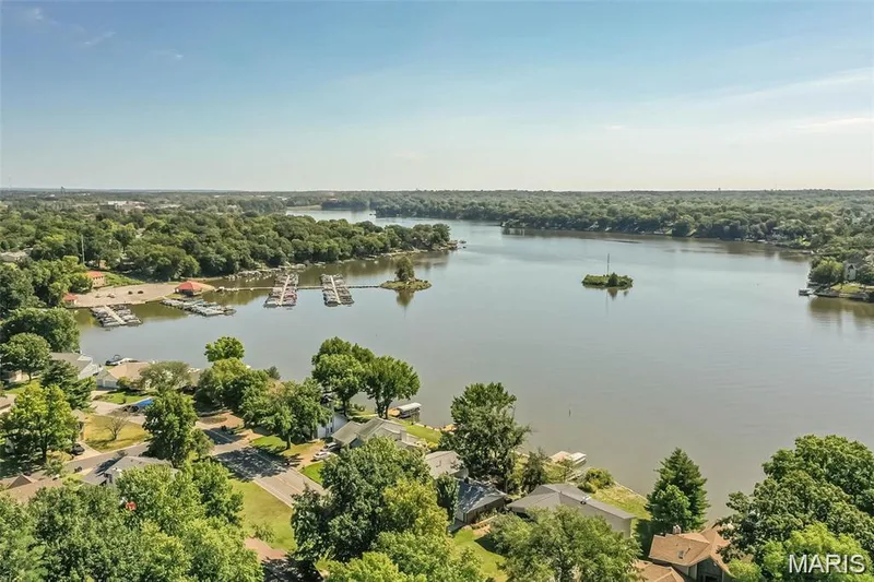 Home is just a short walk to the water and views of the water from the primary bedroom — 12 Pyrenees Drive, Lake St. Louis, MO 63367