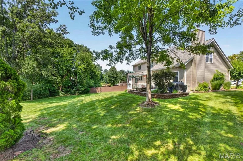 Private backyard backing to woods! — 303 Whispering Woods Drive, St Peters, MO 63304