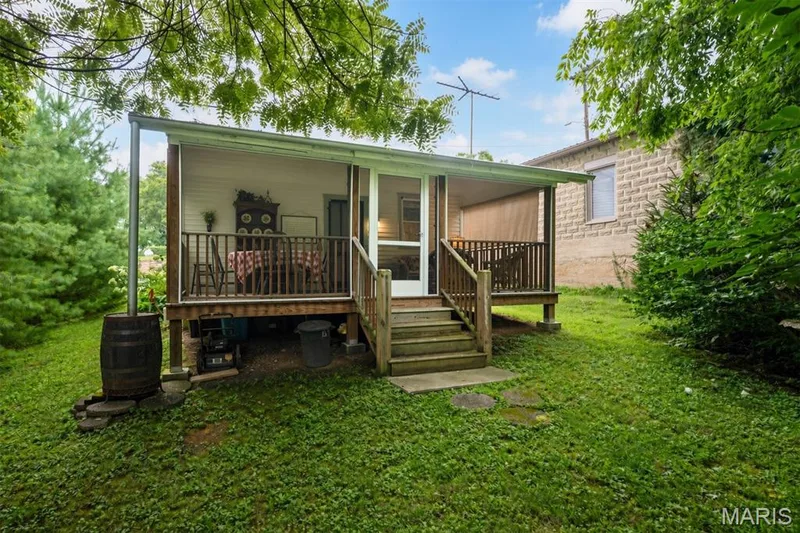 Screened in porch with privacy,  trees and a sense of being away from everyone — 215 Jackson Street, Augusta, MO 63332