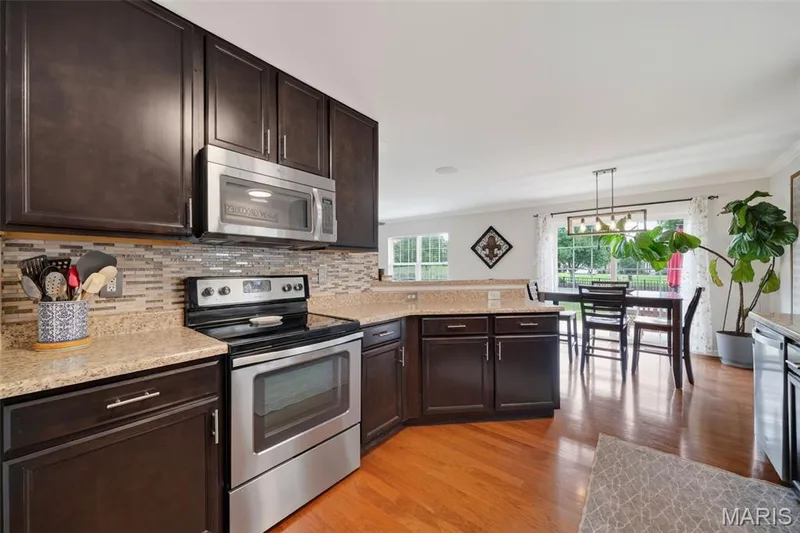 Stainless steel appliances including electric stove/oven, microwave, dishwasher & refrigerator! — 3120 Bentwater Place, St Charles, MO 63301