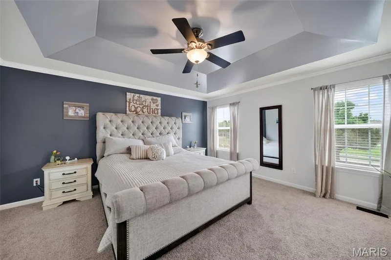 Primary bedroom is large with lots of natural light & stunning coffered ceiling! — 3120 Bentwater Place, St Charles, MO 63301