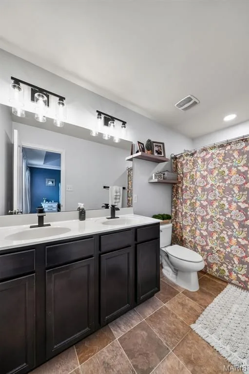 Adult height vanity with double sinks & newly installed faucets & lighting fixtures! — 3120 Bentwater Place, St Charles, MO 63301