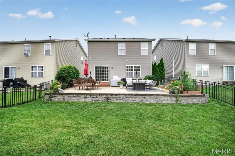 Massive patio for outdoor entertaining & summer BBQ's! — 3120 Bentwater Place, St Charles, MO 63301