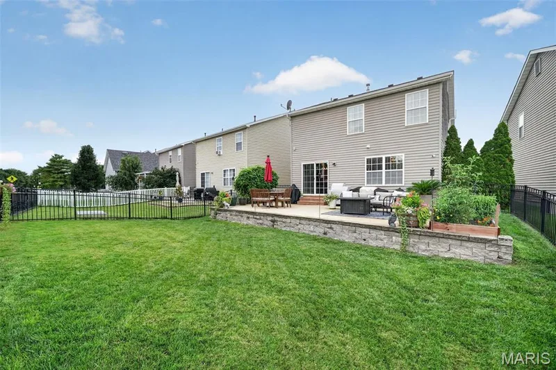 Massive patio for summer BBQ's! Bring out the yard games because this back yard is perfect for playing! — 3120 Bentwater Place, St Charles, MO 63301