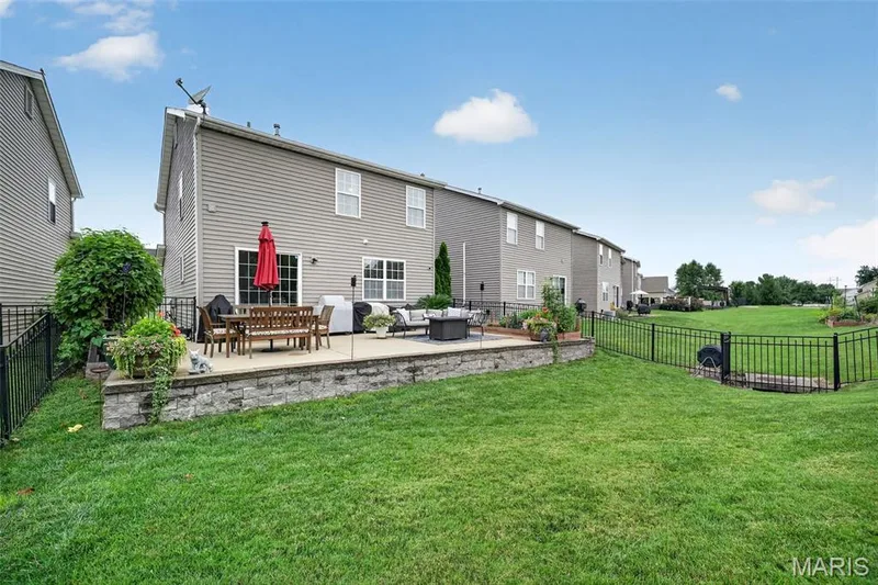 Massive patio is perfect for relaxing with your favorite beverage & enjoying the park scenery! — 3120 Bentwater Place, St Charles, MO 63301