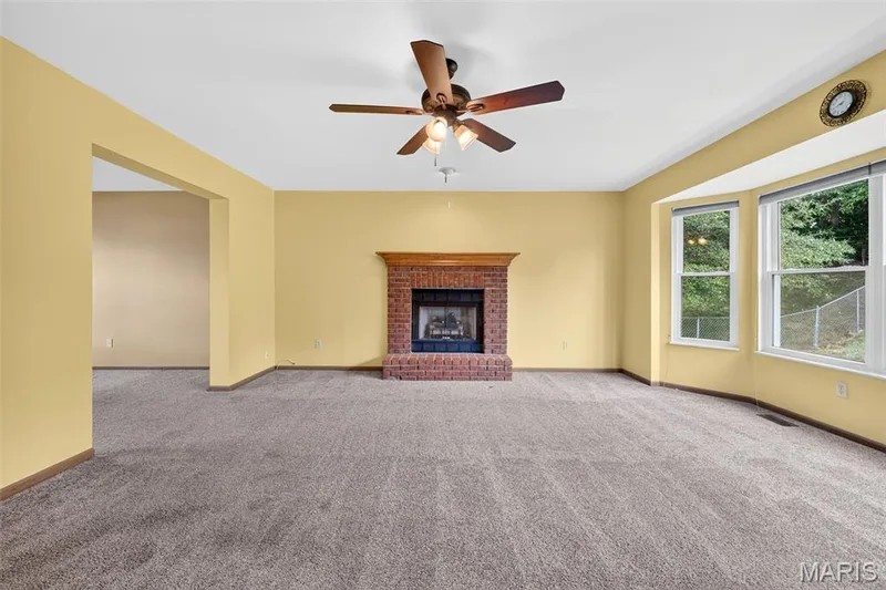 Spacious Family Room w/Newer Carpet & Ceiling Fan — 2714 Red Cedar Parc Drive S, O'Fallon, MO 63368