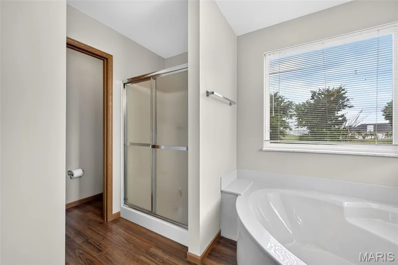 Natural light over tub, separate shower & private water closet — 2714 Red Cedar Parc Drive S, O'Fallon, MO 63368