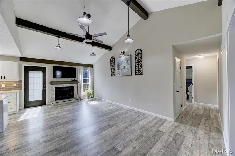Great space just off the kitchen. Could be used as a dining or family room. — 9 Carriage Way E, St Peters, MO 63376