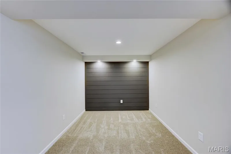 Beautiful accent wall, great for media or game area! — 9 Carriage Way E, St Peters, MO 63376