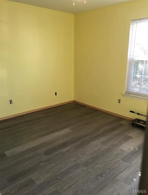 Secondary bedroom. Luxury vinyl plank flooring throughout the unit. — 1040 Sugar Creek Court #4, St Peters, MO 63376