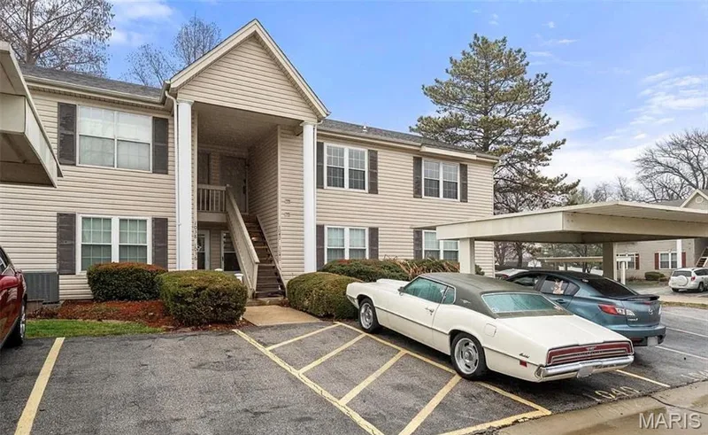 One of 2 parking spots is conveniently near the front door. — 1040 Sugar Creek Court #4, St Peters, MO 63376