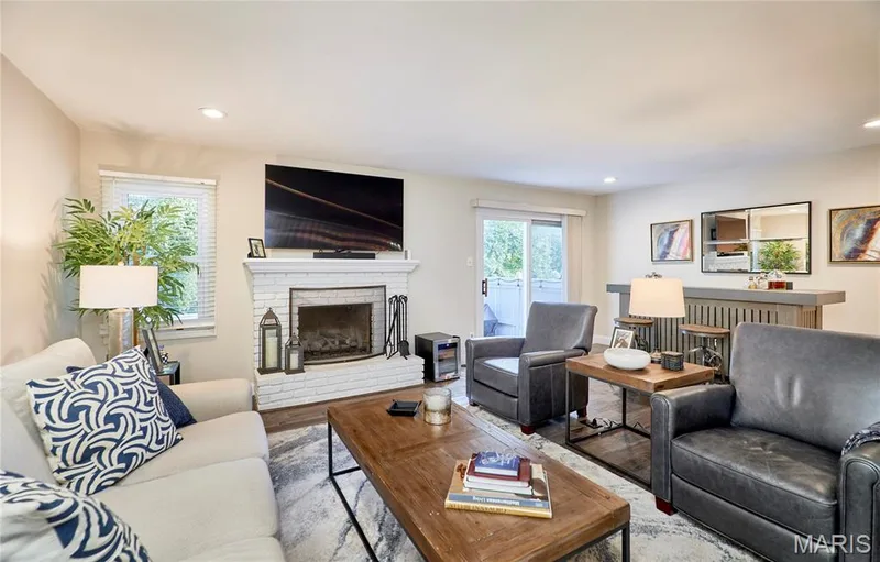 Two windows and siding door brings in plenty of natural sunlight — 16463 Cobbleskille Drive, Chesterfield, MO 63017