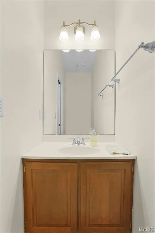 MAIN LEVEL MUD ROOM/LAUNDRY ROOM WITH ADJOINING HALF BATH — 1154 S Charlemagne Drive, Lake St. Louis, MO 63367