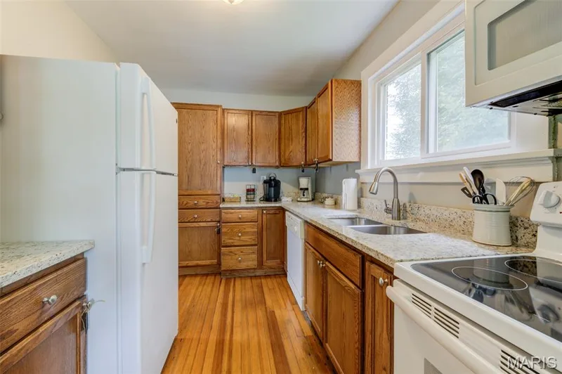 The refrigerator can stay with the home. — 2009 N 3rd Street, St Charles, MO 63301
